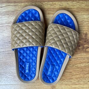 APL Quilted Tan Slide Sandals with Blue Footbed